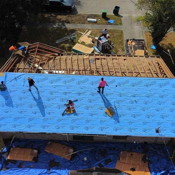 Storm damaged roof before repair in Houston, TX - Terzo Roofing
